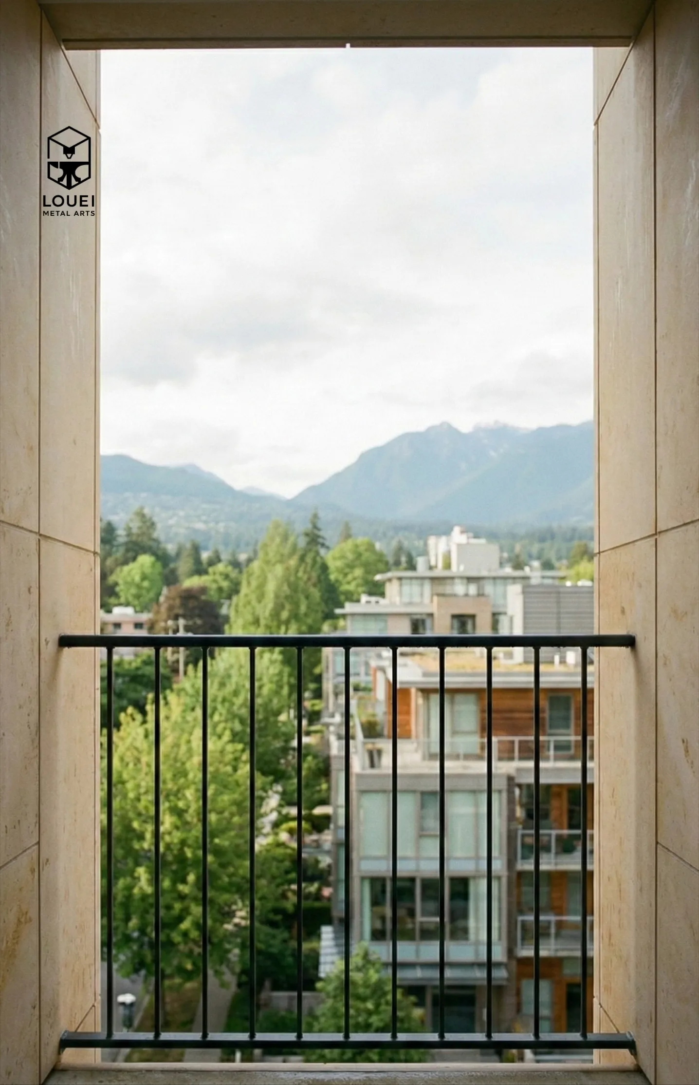 Simple black balcony picket guard framing North Vancouver mountain views