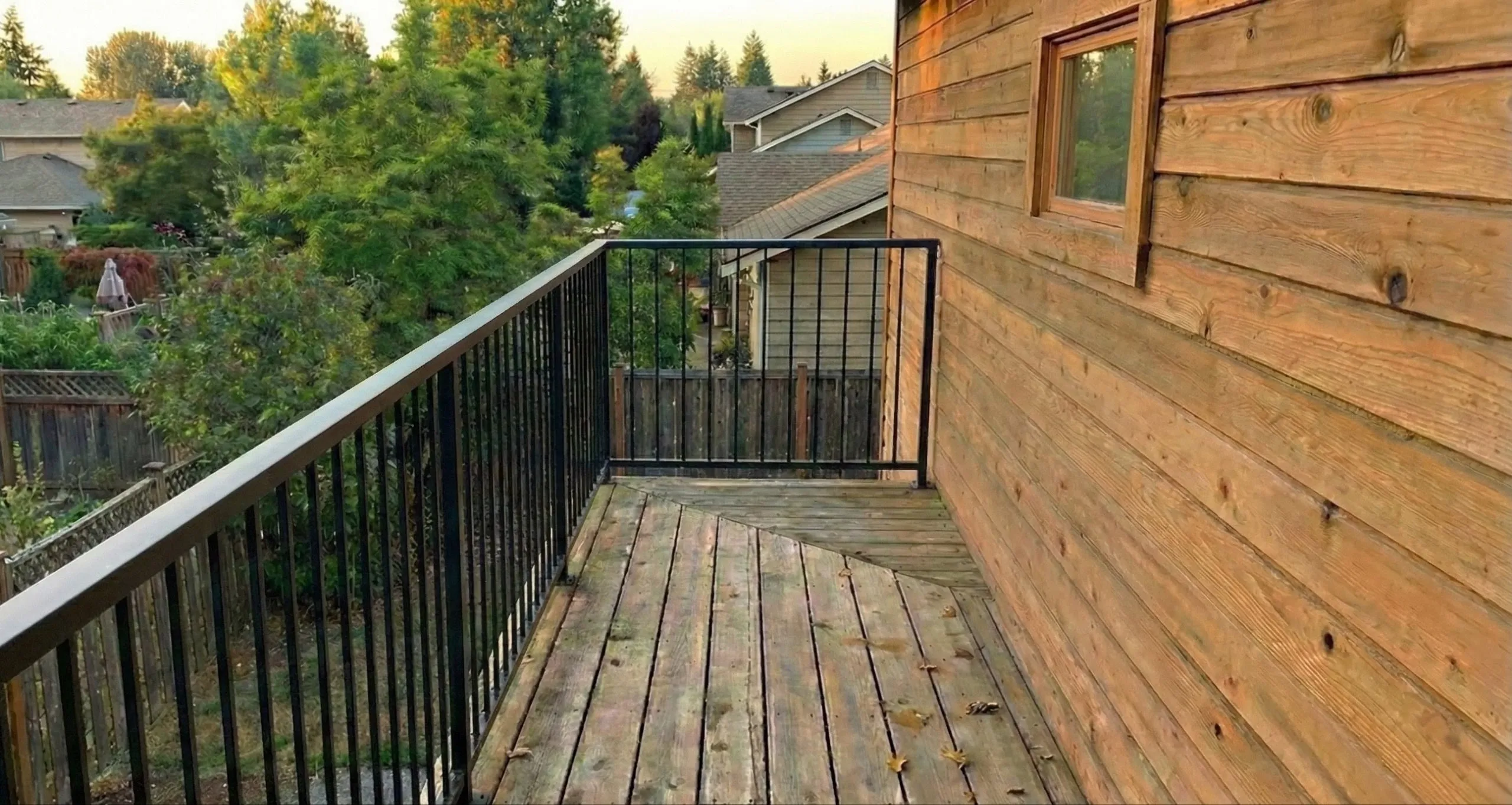 Burnaby residential picket railing on a second-storey balcony.