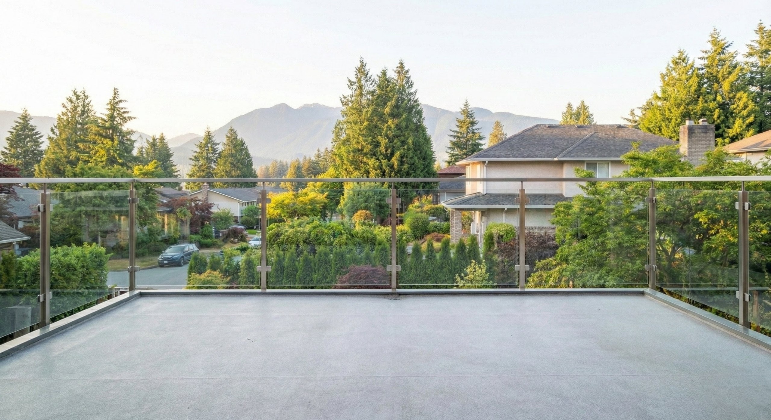 Burnaby multifamily glass balcony railing installation